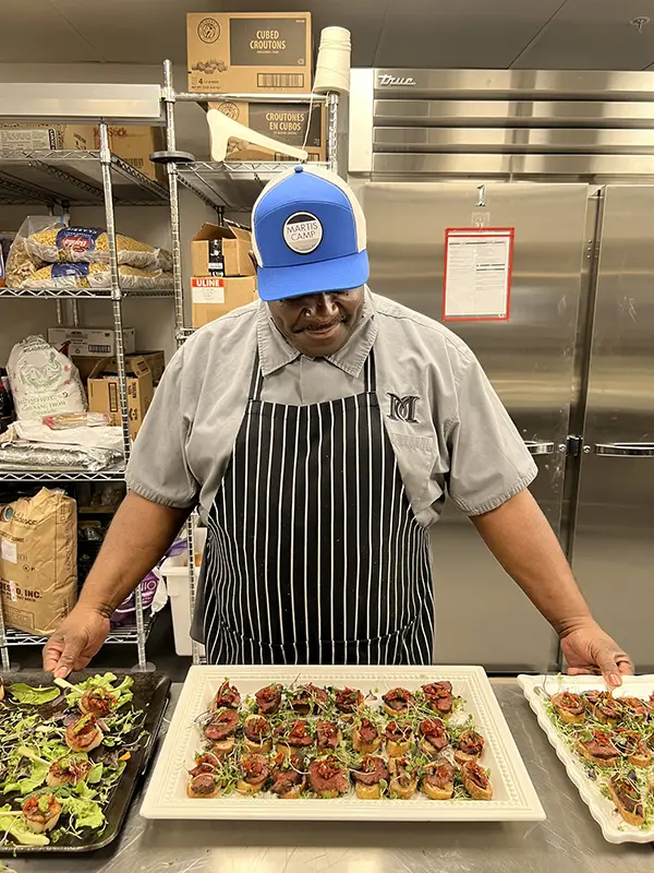 chef posing in kitchen