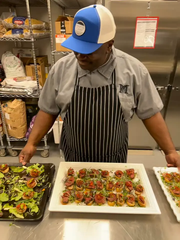 chef posing in kitchen